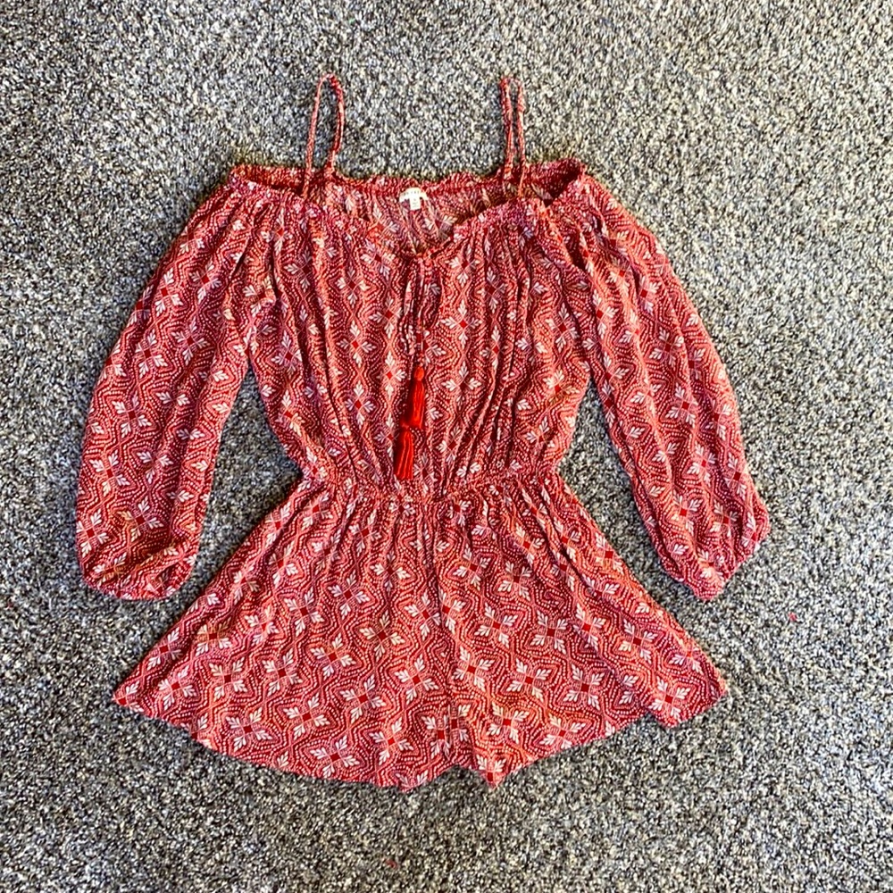 Long sleeved patterned romper